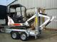 Bobcat 322 con remolque